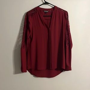 Express cranberry colored blouse. Only worn once. Lace sleeves.